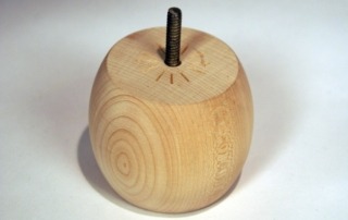 Custom wooden bun feet, available in bulk for manufacturers and high-volume furniture production.